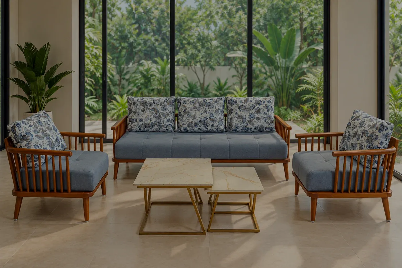A grey-blue sofa set with an open spindle frame, standing in a glazed garden room on a pale stone floor.
